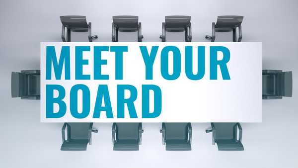 Top down view of a conference table with the text reading: Meet Your Board